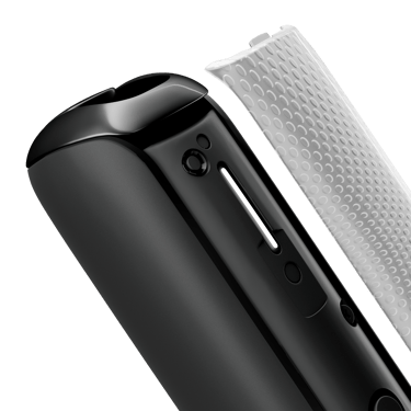 Close-up of Lunar Silver Augmented Pattern Ploom Aura front panel, detached from device.