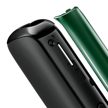 Close-up of Amazon Green Ploom Aura front panel, detached from device.
